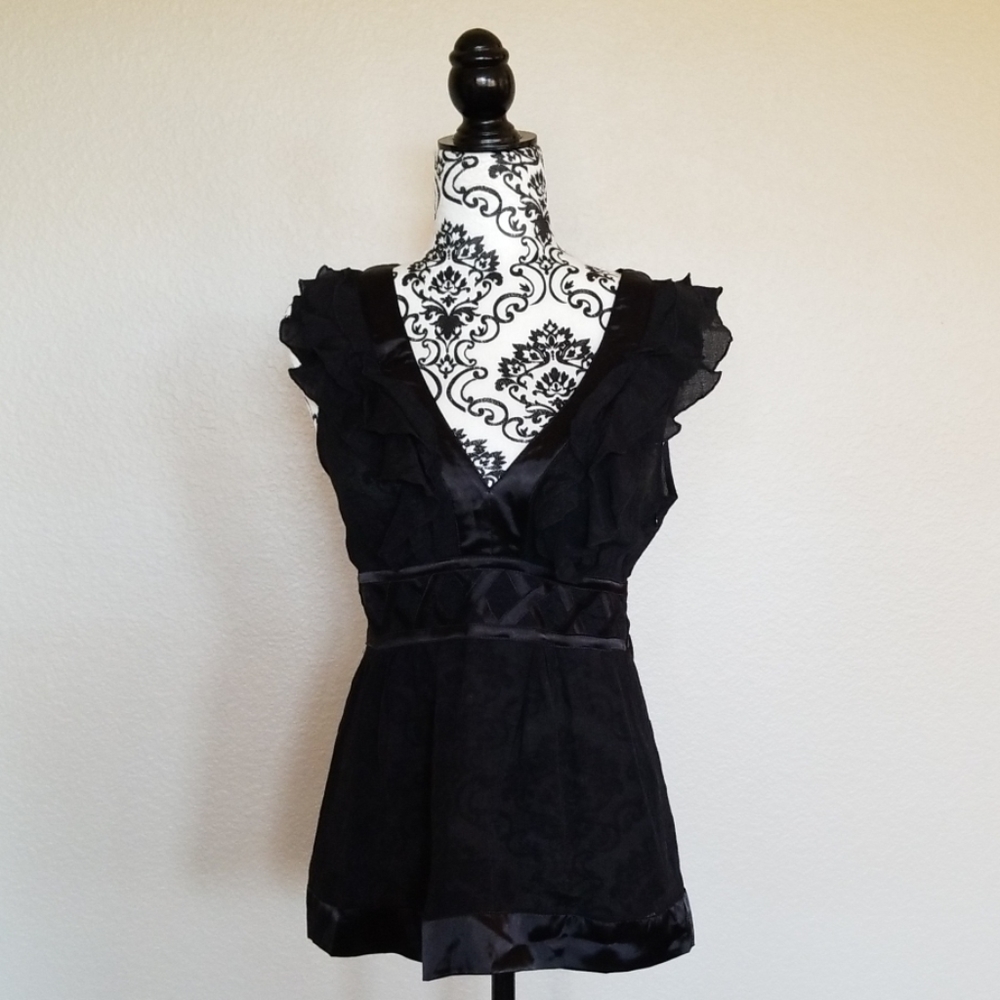 BeBe- Deep v-neck blouse - Never Worn